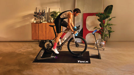 Bicycle mounted on a direct-drive trainer showing compatibility points