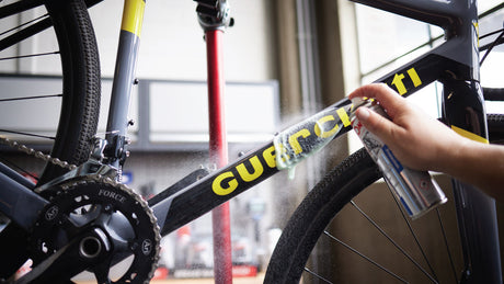 CycleSouq technician completing bicycle maintenance in a workshop